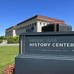 Minnesota History Center sign with building in the background