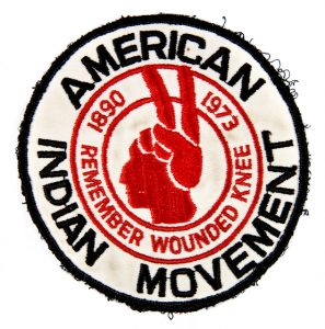 AIM - Remember Wounded Knee patch with black and red embroidery. 1973.