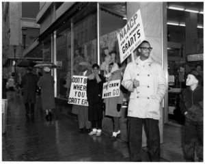 NAACP members picketing outside Woolworth's for integrated lunch counters, St. Paul. April 2, 1960.