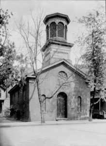 black and white photograph of the exterior of St Peter Claver Catholic Church