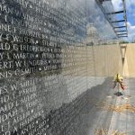 photograph of names of Minnesotan killed in the Vietnam War etched in marble in the Minnesota Vietnam Memorial