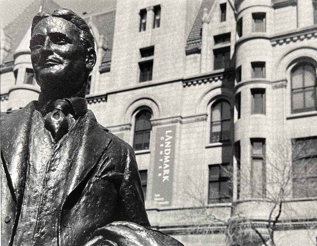F. Scott Fitzgerald statue in front of Saint Paul's Landmark Center. Rice Park, Saint Paul. 2022.