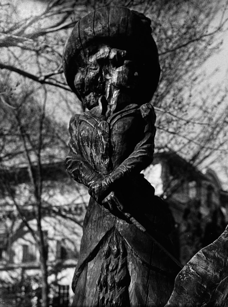 Nina Cliford Wooden Statue