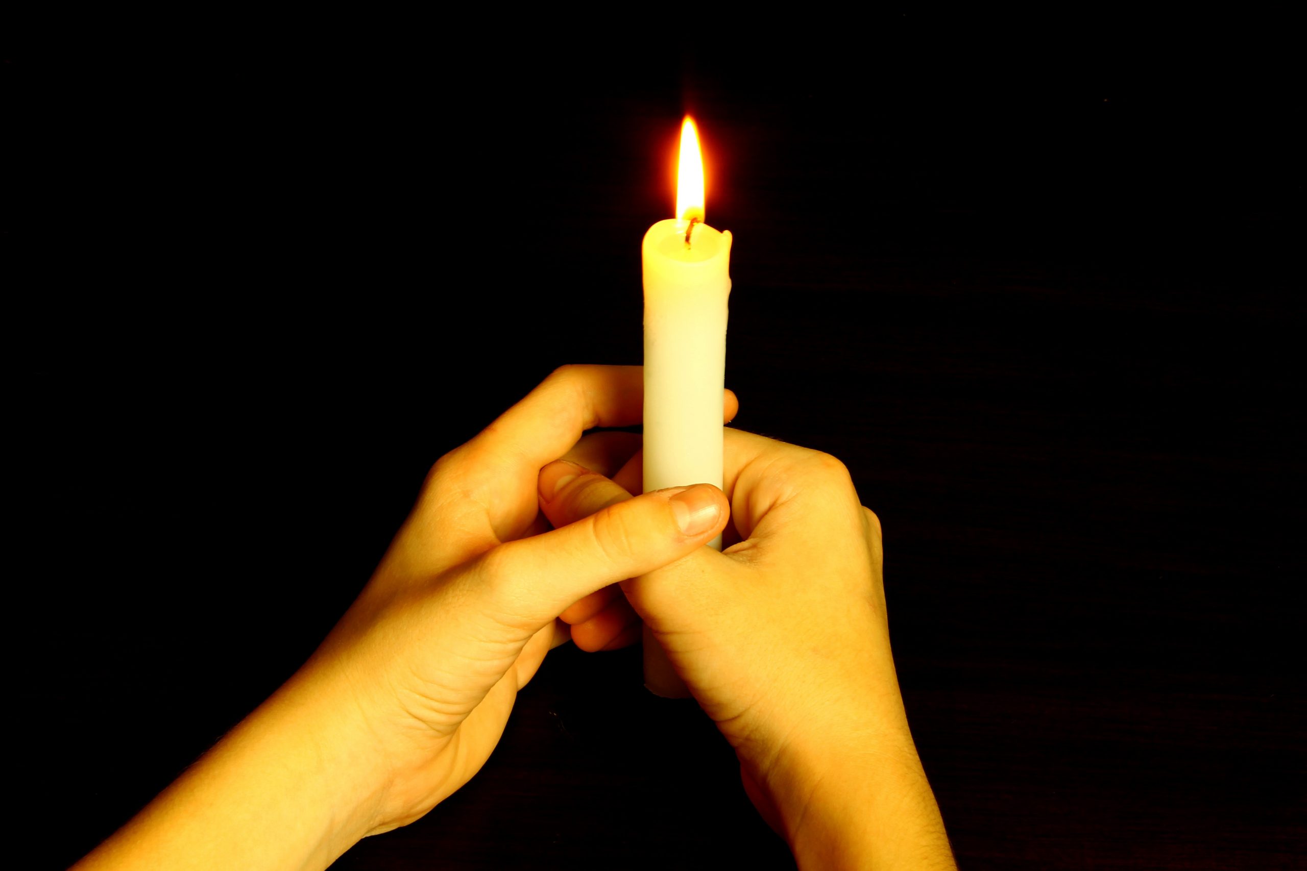 candle in hands