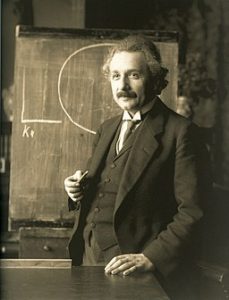 Albert Einstein during a lecture in Vienna in 1921 by Ferdinand Schmutzer [Public domain], via Wikimedia Commons