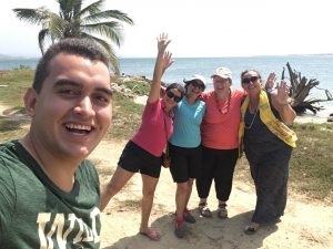 waving on the beach in Colombia