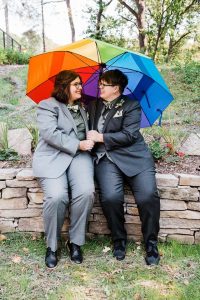 Ren and Grace with rainbow unbrella