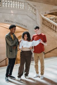 Students looking at a map