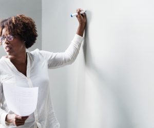 teacher at the white board