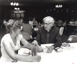Bob Esbjornson with a student in the canteen