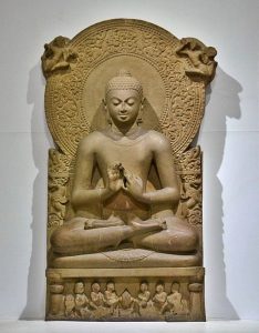 A statue of the Buddha from Sarnath, Uttar Pradesh, India, circa 475 CE. The Buddha is depicted teaching in the lotus position, while making the Dharmacakra mudrā.