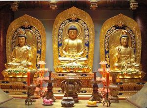 Amitabha Buddha with his attendants Avalokitesvara Bodhisattva, and Mahasthamaprapta Bodhisattva. Hangzhou, Zhejiang province,