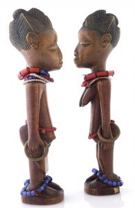 Ibeji twin figures. Yoruba male artist, Nigeria, 20th century. Wellcome Collection, London.